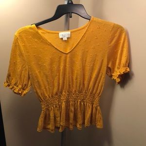 Yellow peplum crop top